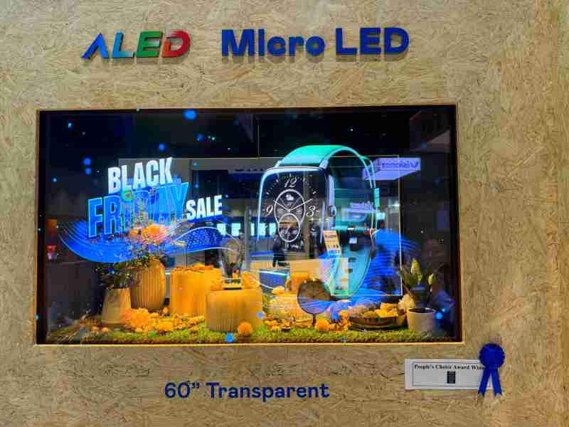 人生就是博60吋高透明度Micro LED显示器获”最佳Micro LED技术应用奖”，，，，将Micro LED面板透明化之设计特性极致发挥，，，，以可扩展性无缝拼接技术打造，，，具备600 nits全画面亮度、、、大于60%穿透率及超过NTSC 110%的优异广色域表现，，，，可依需求灵活应用于各种场域